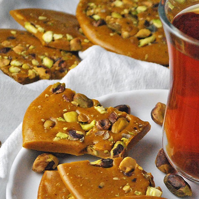 Sohan-e Qom is a traditional Persian saffron brittle candy coming from the city of Qom, Iran. Buttery, crunchy and scented with saffron, this candy is easy to make and utterly addictive with tea.