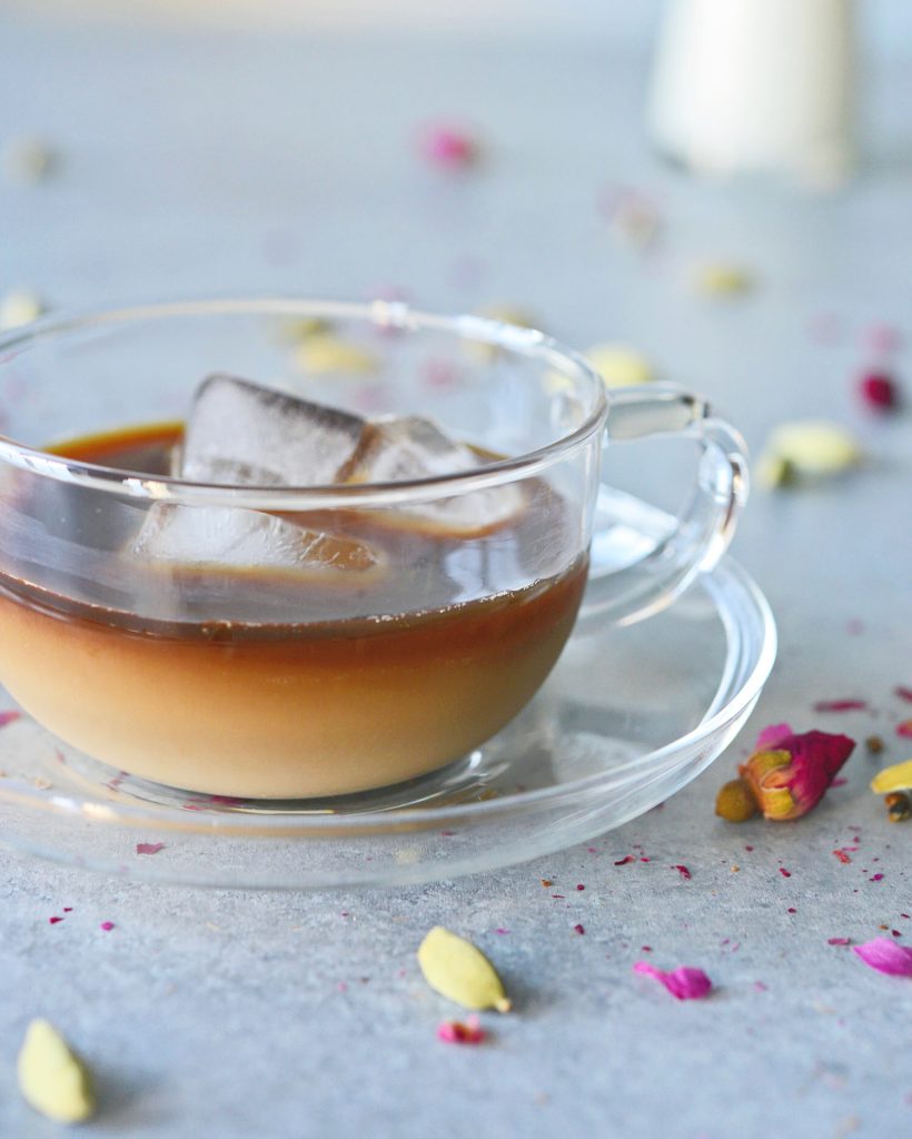 Cardamom rose iced coffee - the warmth of cardamom spice and the floral notes of rose meet in this earthy, delicate Persian-style coffee cocktail. 